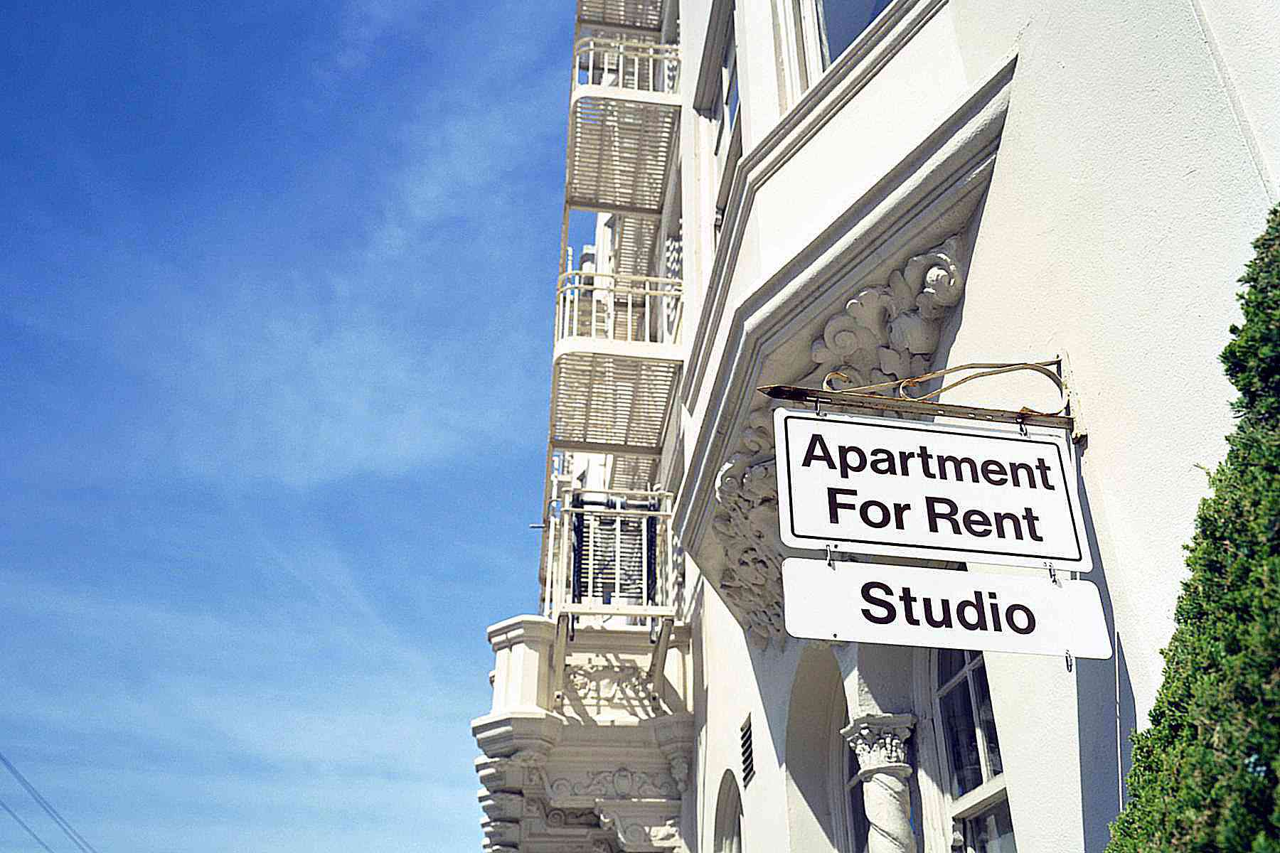 Apartment for Rent sign on building