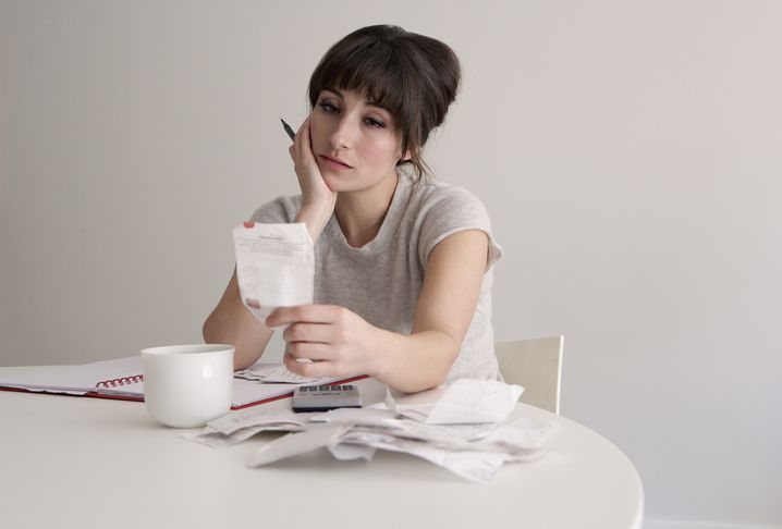 Woman reviewing receipts