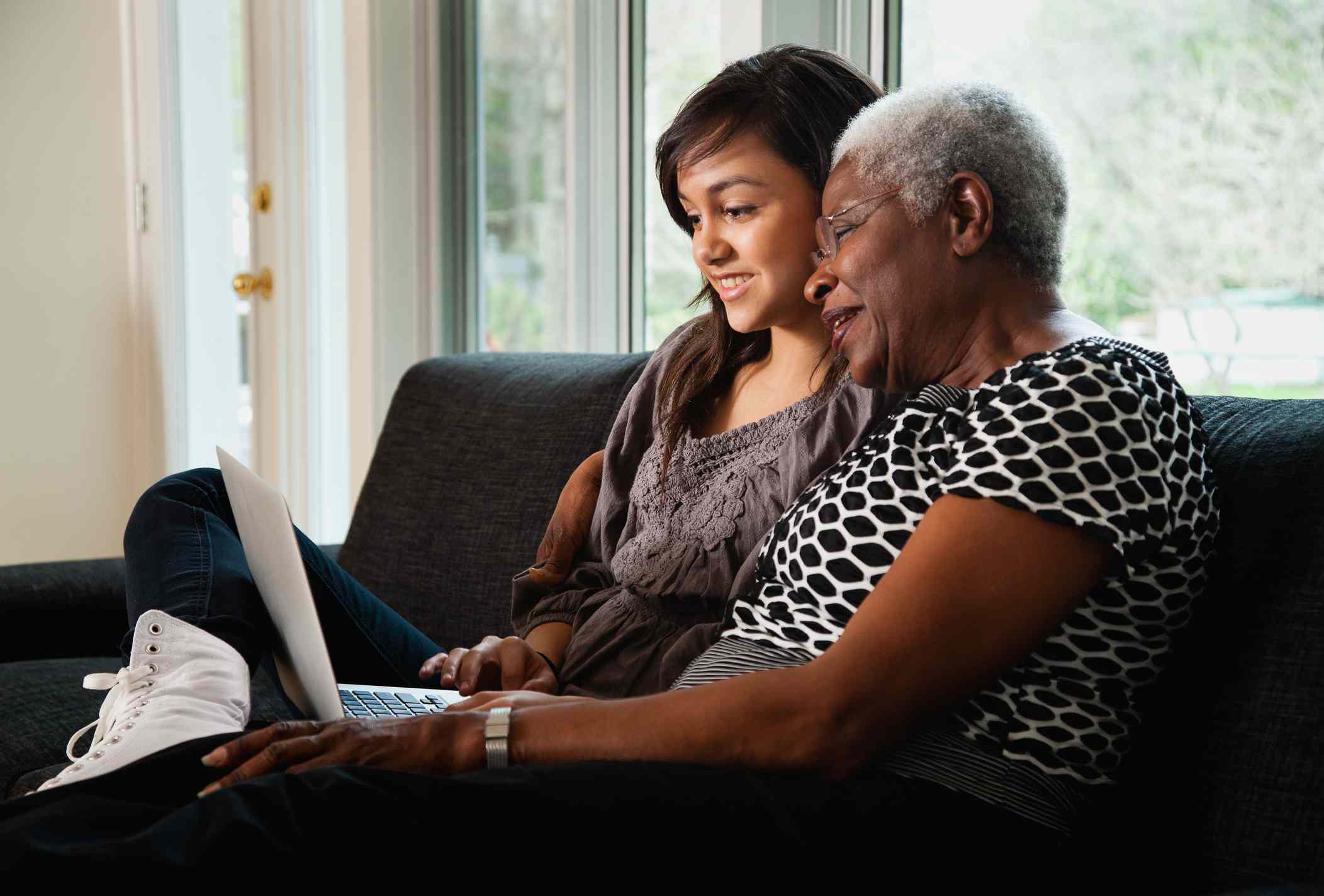 grandmother and grandchild using computer