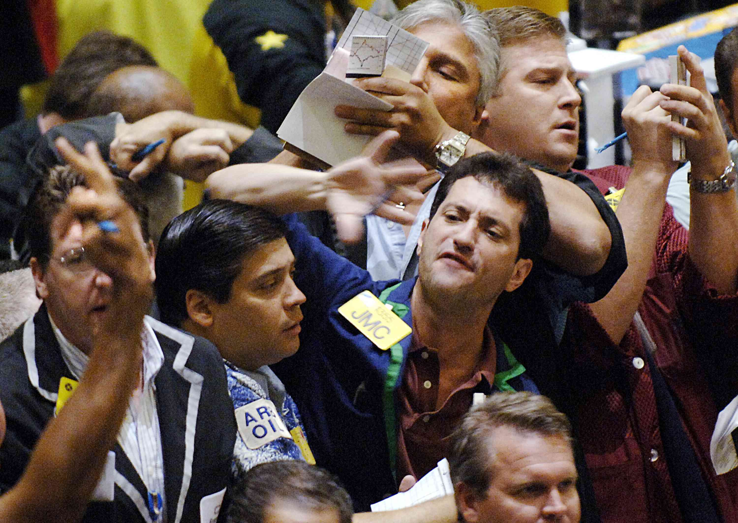 Traders on the floor of an exchange.