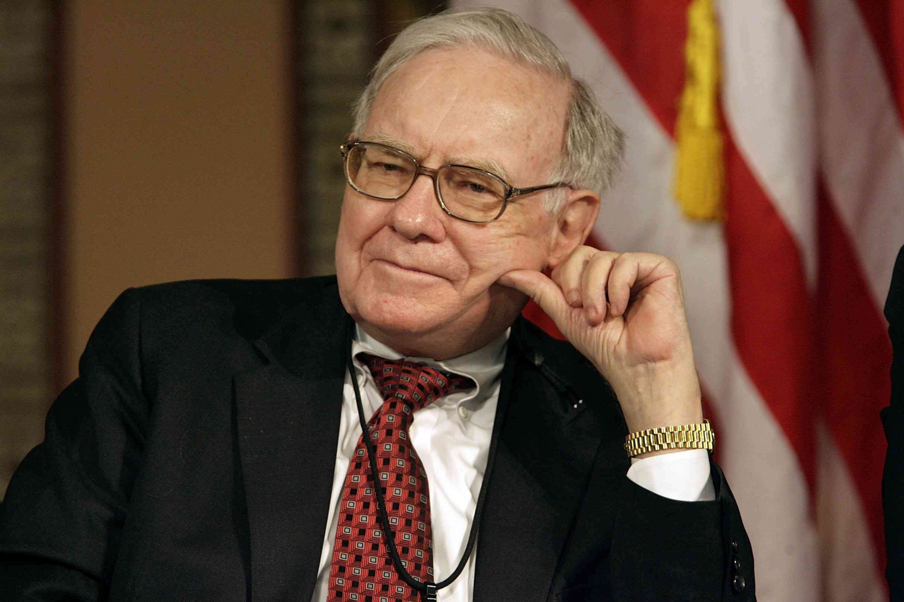 Warren Buffett, chairman and CEO of Berkshire Hathaway Inc., participates in a panel discussion