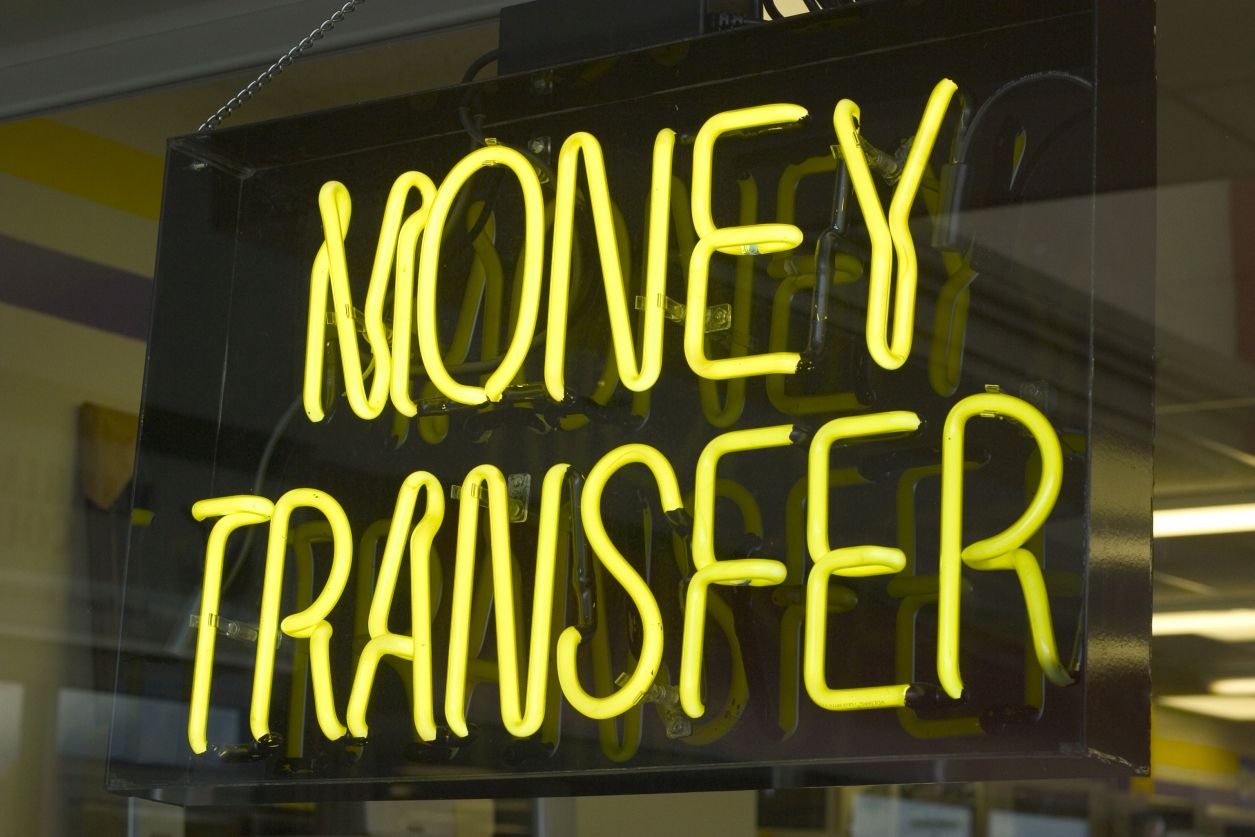 Photo of a money transfer sign.